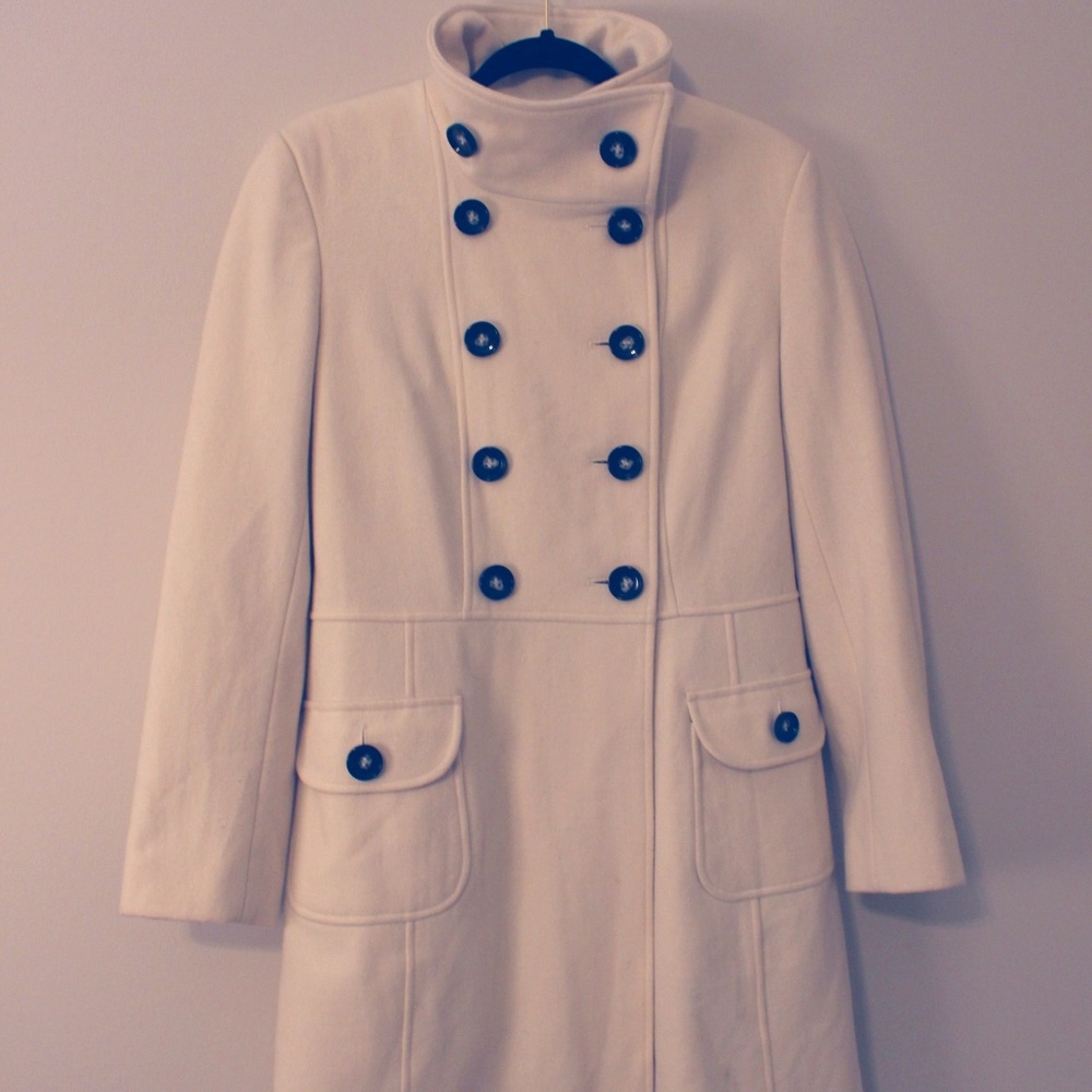 Elegant double-breasted white pea coat